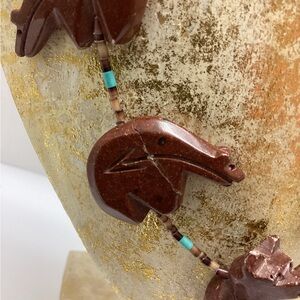 Zuni bear vintage 24” fetish necklace 
with turquoise colored accents